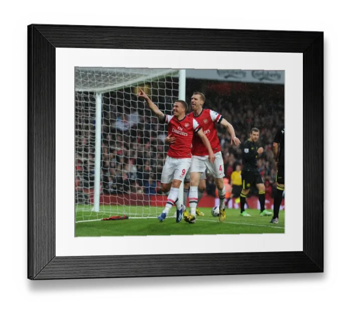 Framed Print : Celebrating Glory: Podolski and Mertesacker's Goal Bliss (Arsenal vs Wigan Athletic, 2013) Framed Print : Celebrating Glory: Podolski and Mertesacker's Goal Bliss (Arsenal vs Wigan Athletic, 2013)
