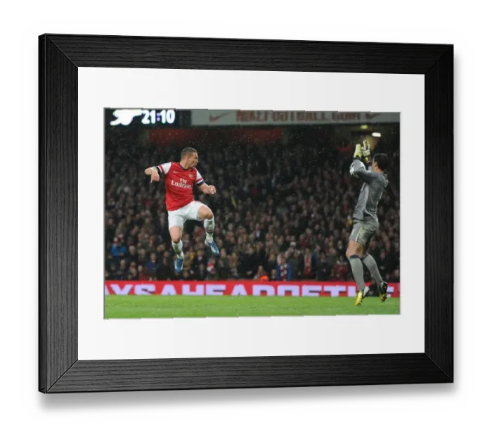 Framed Print : Lukas Podolski Scores Chip Over Joel Robles: Arsenal vs Wigan Athletic, Premier League 2012-13 Framed Print : Lukas Podolski Scores Chip Over Joel Robles: Arsenal vs Wigan Athletic, Premier League 2012-13