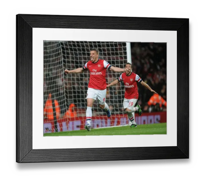 Framed Print : Arsenal's Dominance: Podolski's Brace - Arsenal Crushes Wigan Athletic 4-1 in Premier League (2012-13) Framed Print : Arsenal's Dominance: Podolski's Brace - Arsenal Crushes Wigan Athletic 4-1 in Premier League (2012-13)