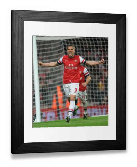 Framed Print : Arsenal's Triumph: Podolski's Brace in Arsenal's 4-1 Victory over Wigan Athletic (Barclays Premier League, Emirates Stadium, 14 / 5 / 13)