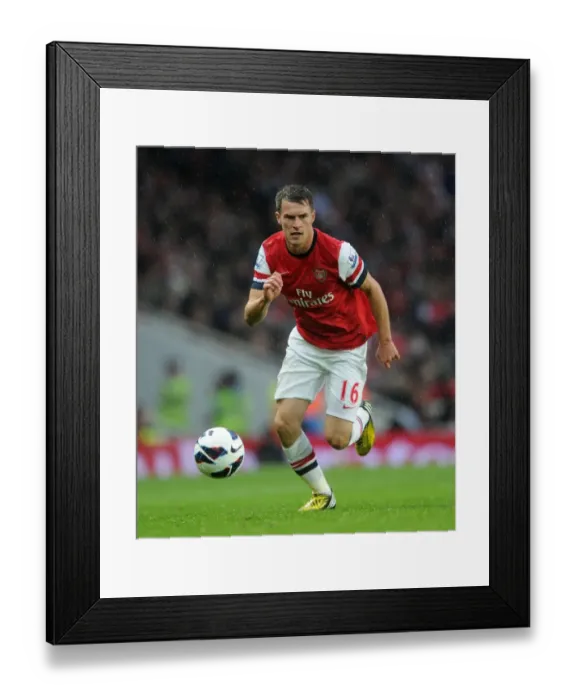 Framed Print : Arsenal's Aaron Ramsey Scores in 4-1 Victory over Wigan Athletic in the Premier League, Emirates Stadium (2013) Framed Print : Arsenal's Aaron Ramsey Scores in 4-1 Victory over Wigan Athletic in the Premier League, Emirates Stadium (2013)