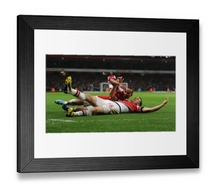 Framed Print : Arsenal: Ramsey and Walcott's Euphoric Goal Celebration (2012-13) vs Wigan Athletic Framed Print : Arsenal: Ramsey and Walcott's Euphoric Goal Celebration (2012-13) vs Wigan Athletic