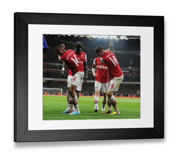 Framed Print : Arsenal's Unforgettable Victory: Ramsey and Walcott's Goal Celebration vs. Wigan Athletic (2012-13)