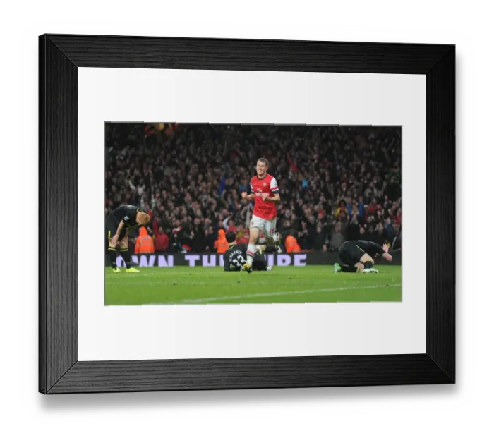 Framed Print : Ramsey's Game-Winning Goal: Arsenal Secures Victory Against Wigan Athletic (2012-13)