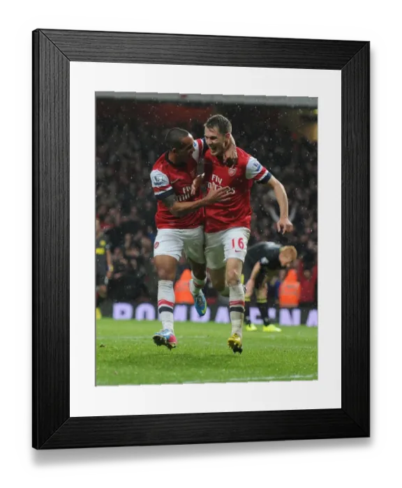 Framed Print : Arsenal: Ramsey and Walcott's Goal Celebration vs Wigan Athletic (2012-13)