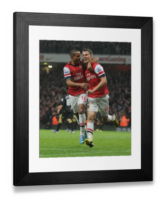 Framed Print : Arsenal's Double Celebration: Ramsey and Walcott Rejoice in Goal Scoring Moment vs. Wigan (2012-13) Framed Print : Arsenal's Double Celebration: Ramsey and Walcott Rejoice in Goal Scoring Moment vs. Wigan (2012-13)