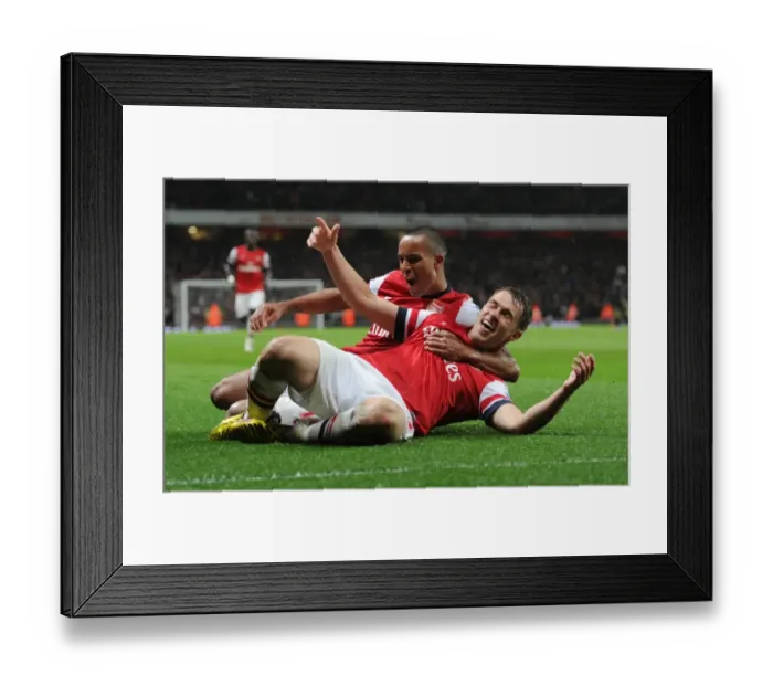 Framed Print : Arsenal: Ramsey and Walcott's Euphoric Goal Celebration (2012-13) vs Wigan Athletic Framed Print : Arsenal: Ramsey and Walcott's Euphoric Goal Celebration (2012-13) vs Wigan Athletic