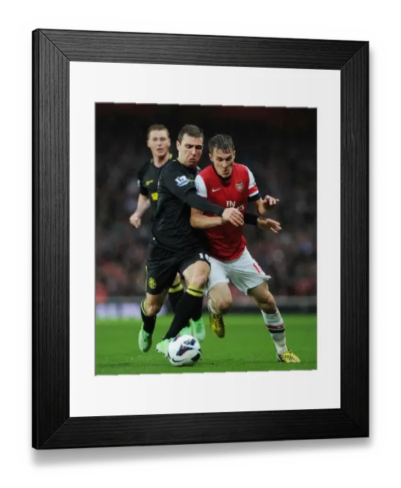Framed Print : Arsenal's Aaron Ramsey Outwits James McArthur: Premier League Battle Framed Print : Arsenal's Aaron Ramsey Outwits James McArthur: Premier League Battle