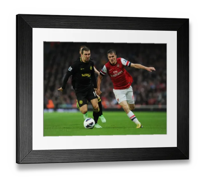 Framed Print : Arsenal's Aaron Ramsey Outsmarts James McArthur: The Skillful Pass at Emirates Stadium, 2013