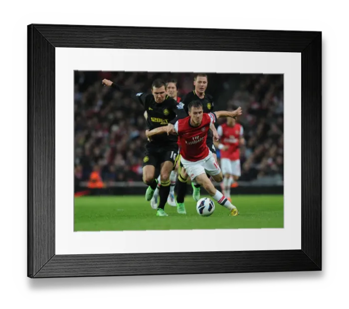 Framed Print : Arsenal's Aaron Ramsey Outsmarts James McArthur with a Masterful Dribble, 2012-13 Framed Print : Arsenal's Aaron Ramsey Outsmarts James McArthur with a Masterful Dribble, 2012-13