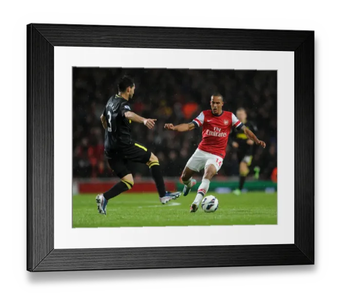 Framed Print : Theo Walcott's Brilliant Performance: Arsenal Crushes Wigan Athletic 4-1