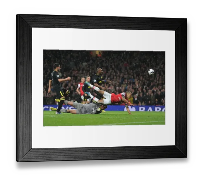 Framed Print : Theo Walcott's Goal: Arsenal Secures Victory Over Wigan Athletic (2012-13) Framed Print : Theo Walcott's Goal: Arsenal Secures Victory Over Wigan Athletic (2012-13)