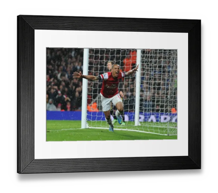 Framed Print : Theo Walcott's Brace: Arsenal Clinch Victory Against Wigan Athletic (2012-13) Framed Print : Theo Walcott's Brace: Arsenal Clinch Victory Against Wigan Athletic (2012-13)