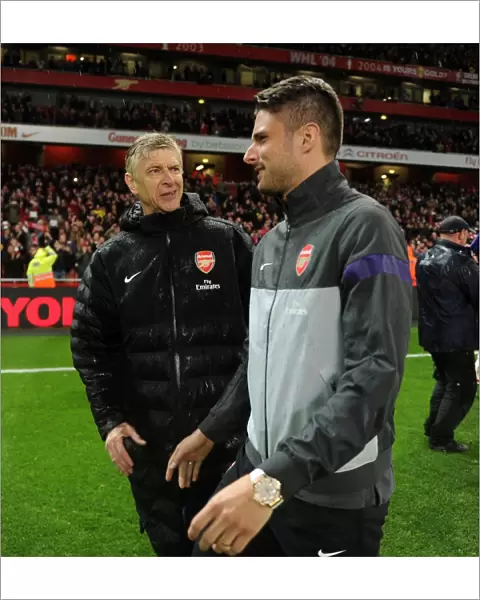 Arsene Wenger the Arsenal Manager with Olivier Giroud (Arsenal) during the lap of