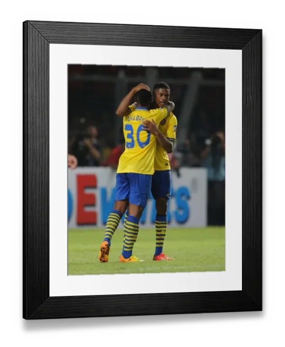 Framed Print : Arsenal Stars: Akpom and Gnabry Celebrate Goal Against Indonesia All-Stars Framed Print : Arsenal Stars: Akpom and Gnabry Celebrate Goal Against Indonesia All-Stars