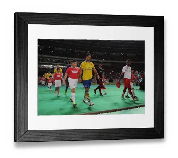 Framed Print : Arsenal's Dominant Pre-Season Victory: Mikel Arteta Leads the Gunners to a 7-0 Win Over Indonesia Dream Team (2013) Framed Print : Arsenal's Dominant Pre-Season Victory: Mikel Arteta Leads the Gunners to a 7-0 Win Over Indonesia Dream Team (2013)