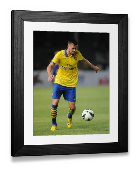 Framed Print : Arsenal's Carl Jenkinson Faces Off Against Indonesia All-Stars in 2013-14 Pre-Season Clash Framed Print : Arsenal's Carl Jenkinson Faces Off Against Indonesia All-Stars in 2013-14 Pre-Season Clash