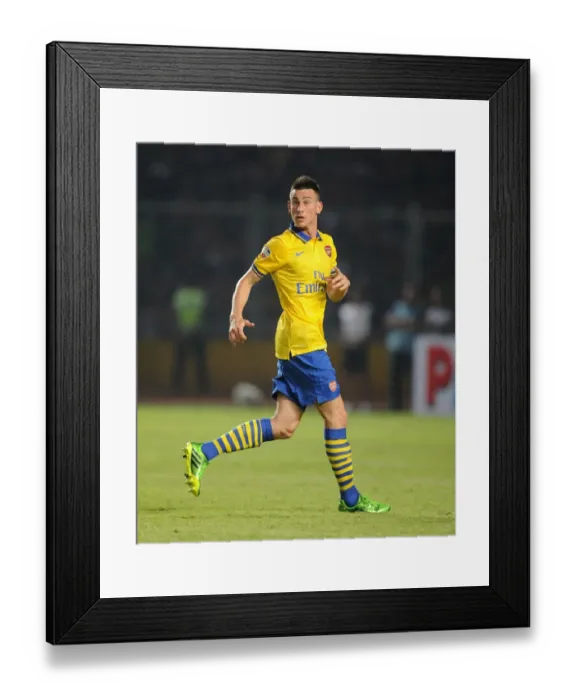 Framed Print : Arsenal's Laurent Koscielny Faces Indonesia All-Stars in 2013
