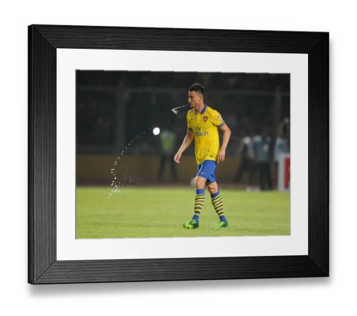 Framed Print : Laurent Koscielny Faces Off Against Indonesia All-Stars in 2013