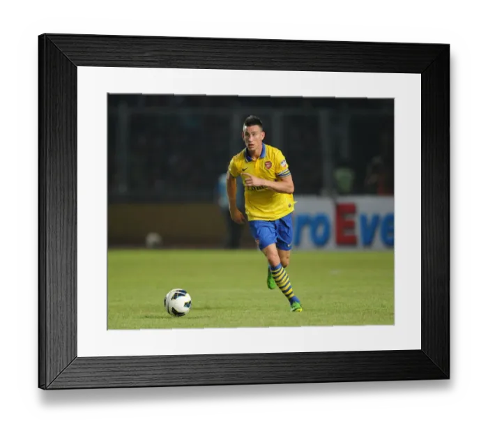 Framed Print : Arsenal's Koscielny Faces Off Against Indonesia All-Stars in 2013 Framed Print : Arsenal's Koscielny Faces Off Against Indonesia All-Stars in 2013