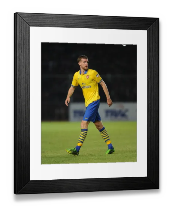 Framed Print : Per Mertesacker Faces Indonesia All-Stars in 2013 Framed Print : Per Mertesacker Faces Indonesia All-Stars in 2013