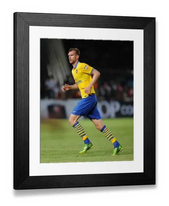 Framed Print : Per Mertesacker: Arsenal Star in Indonesia Dream Team Clash (2013-14) Framed Print : Per Mertesacker: Arsenal Star in Indonesia Dream Team Clash (2013-14)