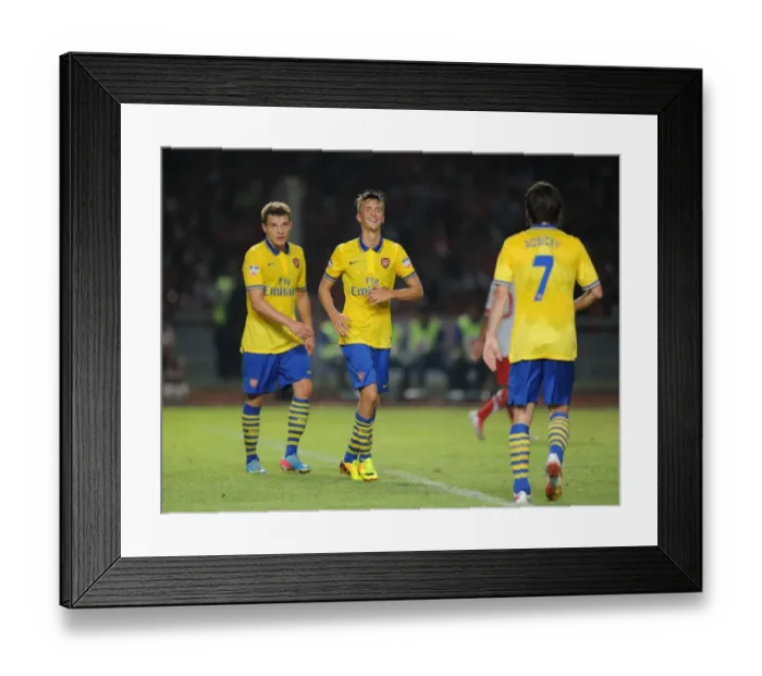 Framed Print : Arsenal's Triumph: Olsson, Rosicky, and Eisfeld Score in Indonesia All-Stars Clash
