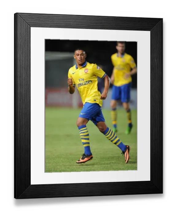 Framed Print : Alex Oxlade-Chamberlain in Action against Indonesia All-Stars (2013)