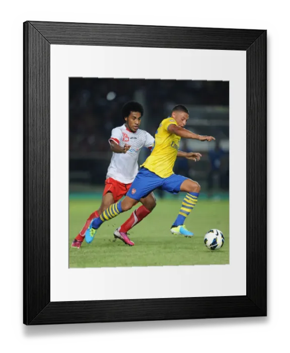 Framed Print : Alex Oxlade-Chamberlain vs. Ian Luis Kabes: Arsenal vs. Indonesia All-Stars, 2013 Framed Print : Alex Oxlade-Chamberlain vs. Ian Luis Kabes: Arsenal vs. Indonesia All-Stars, 2013