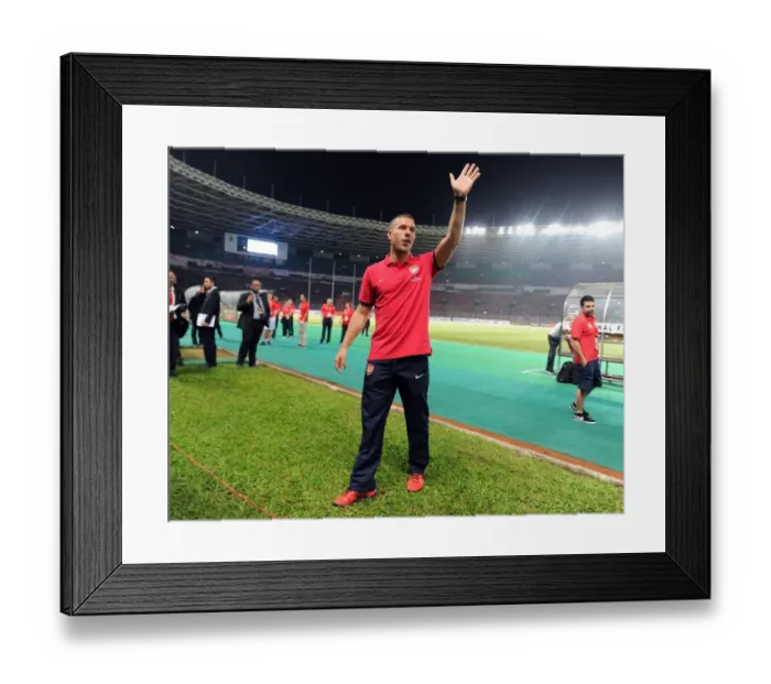 Framed Print : Lukas Podolski Waves to Arsenal Fans in Indonesia (2013-14)