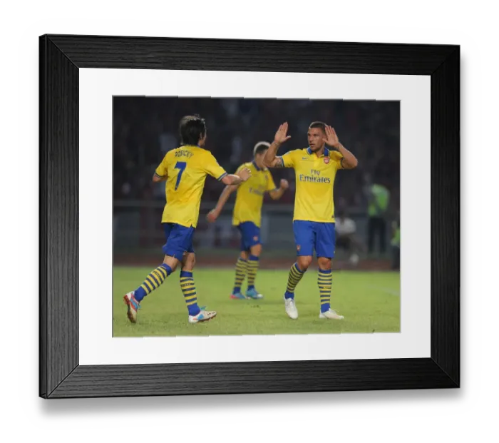 Framed Print : Arsenal Stars: Lukas Podolski and Tomas Rosicky Celebrate Goal Against Indonesia All-Stars Framed Print : Arsenal Stars: Lukas Podolski and Tomas Rosicky Celebrate Goal Against Indonesia All-Stars