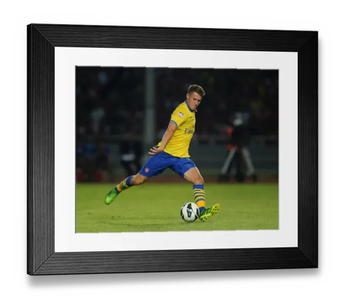 Framed Print : Aaron Ramsey vs Indonesia All-Stars: Arsenal Star Faces Off in 2013-14 Tour Framed Print : Aaron Ramsey vs Indonesia All-Stars: Arsenal Star Faces Off in 2013-14 Tour