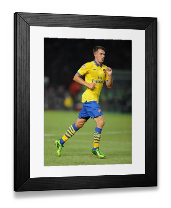 Framed Print : Aaron Ramsey Faces Off Against Indonesia All-Stars in 2013: Arsenal Star's Jakarta Showdown Framed Print : Aaron Ramsey Faces Off Against Indonesia All-Stars in 2013: Arsenal Star's Jakarta Showdown