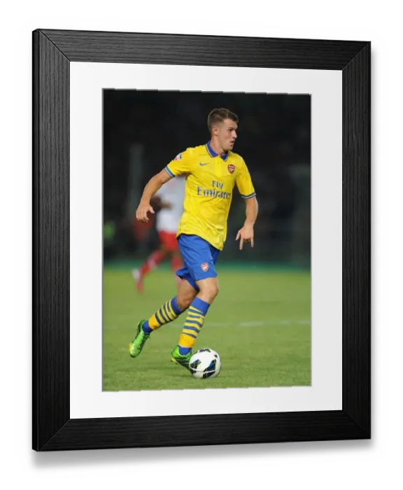 Framed Print : Aaron Ramsey Faces Off Against Indonesia All-Stars in 2013 Showdown Framed Print : Aaron Ramsey Faces Off Against Indonesia All-Stars in 2013 Showdown