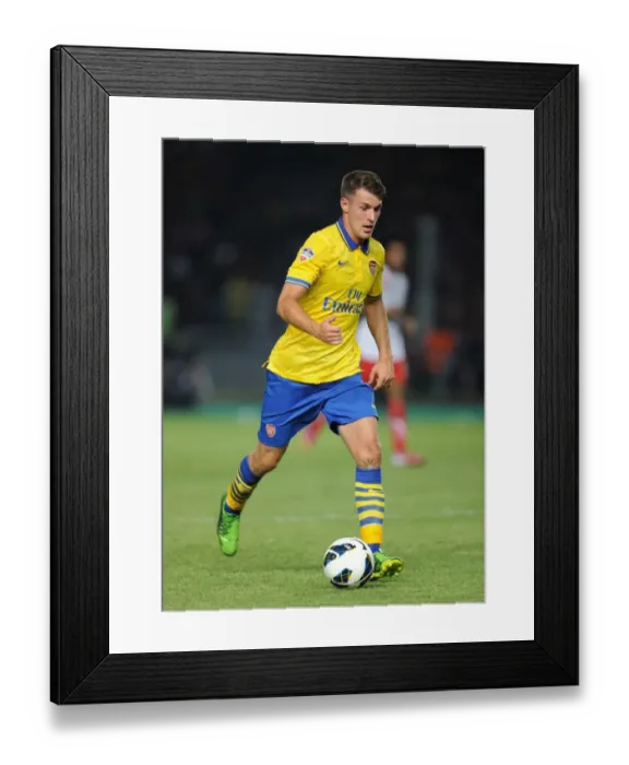 Framed Print : Aaron Ramsey Clashes with Indonesia All-Stars: Arsenal Star's 2013 Showdown