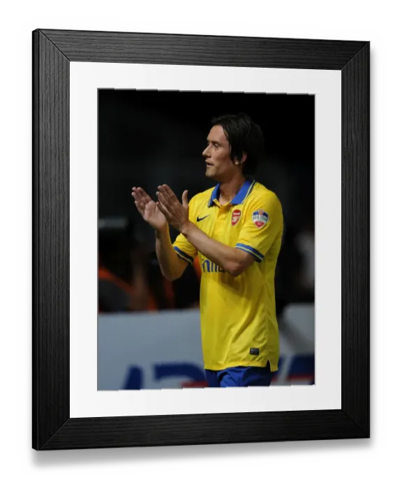 Framed Print : Arsenal's Tomas Rosicky Shines in Indonesia Dream Team Clash (2013-14)