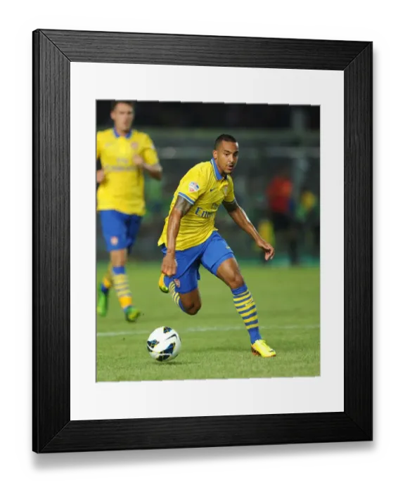 Framed Print : Theo Walcott Faces Off Against Indonesia All-Stars in 2013 Framed Print : Theo Walcott Faces Off Against Indonesia All-Stars in 2013