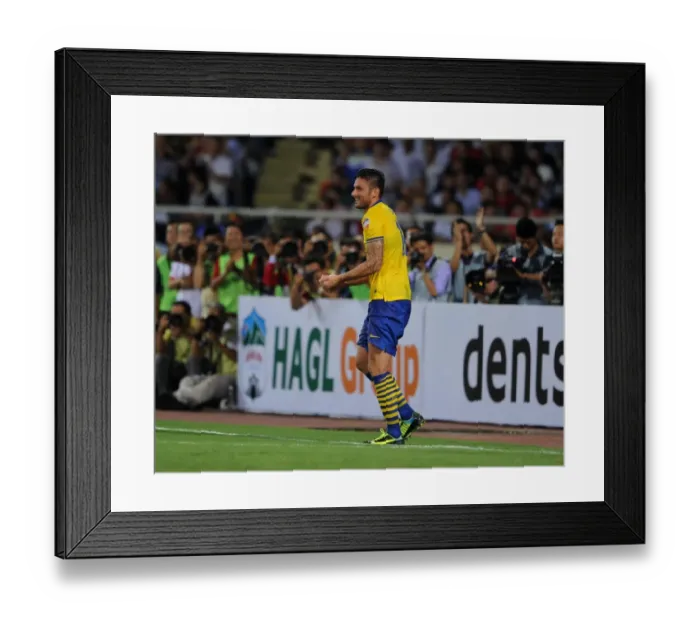 Framed Print : Olivier Giroud's Hat-Trick: Arsenal's Triumph in Hanoi, Vietnam (2013) Framed Print : Olivier Giroud's Hat-Trick: Arsenal's Triumph in Hanoi, Vietnam (2013)