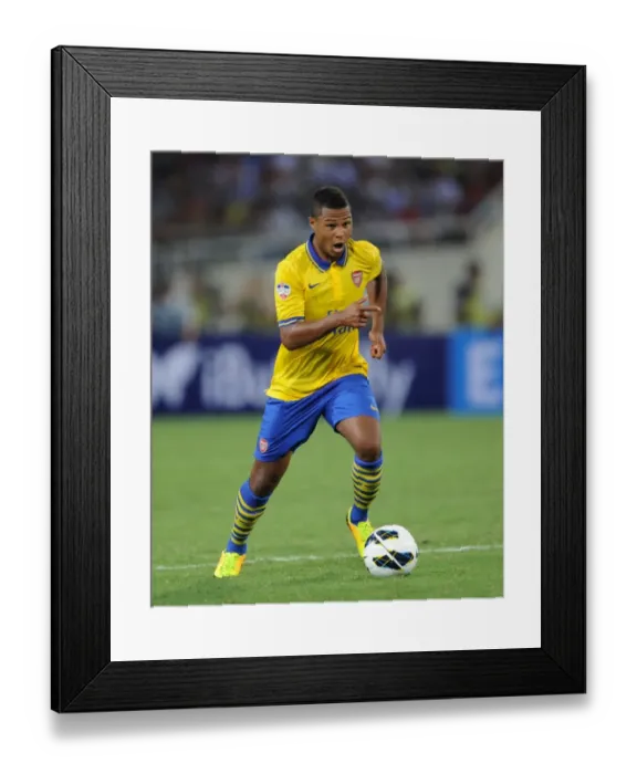 Framed Print : Serge Gnabry in Action: Arsenal vs. Vietnam (2013-14)