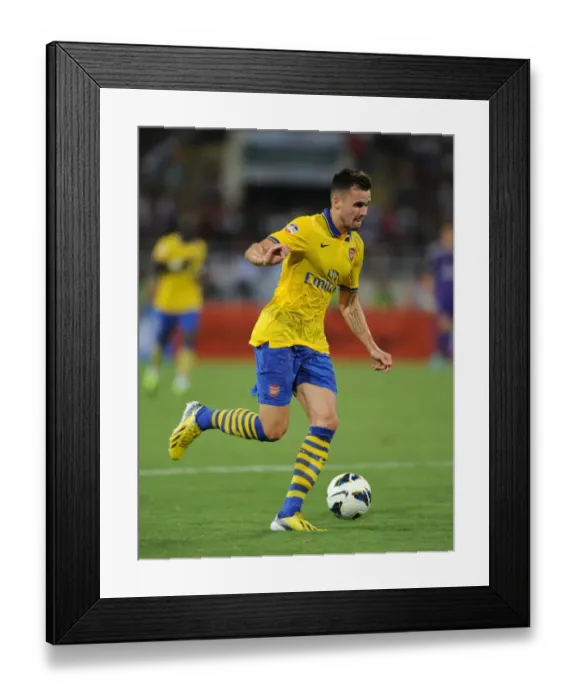 Framed Print : Carl Jenkinson in Action: Vietnam vs. Arsenal (2013-14) Framed Print : Carl Jenkinson in Action: Vietnam vs. Arsenal (2013-14)