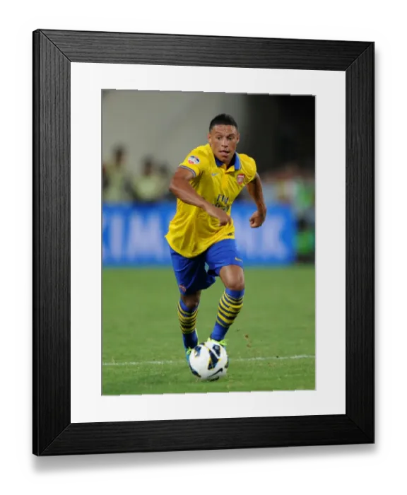 Framed Print : Alex Oxlade-Chamberlain in Action: Vietnam vs. Arsenal (2013)