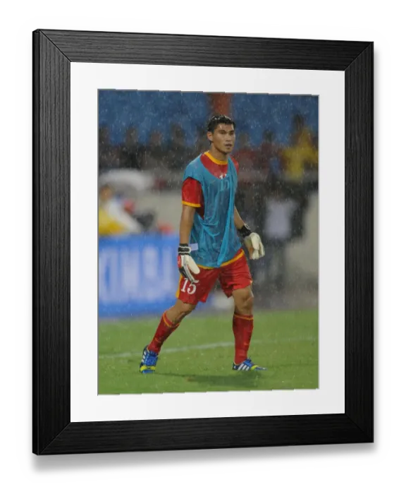 Framed Print : Dao Van Phong Steps Up: Vietnam's Unlikely Goalkeeper Against Arsenal Framed Print : Dao Van Phong Steps Up: Vietnam's Unlikely Goalkeeper Against Arsenal