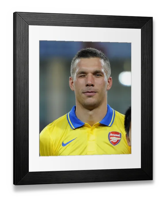Framed Print : Lukas Podolski in Action: Vietnam vs. Arsenal (2013-14)