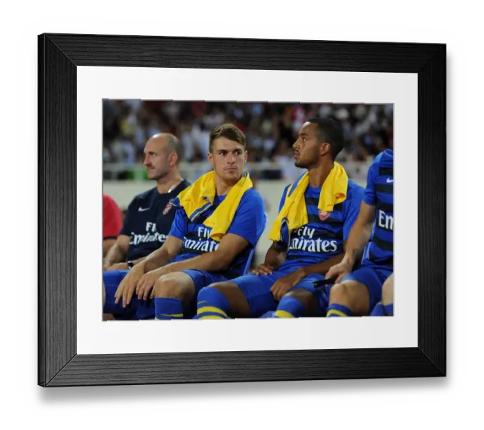 Framed Print : Arsenal Stars Ramsey and Walcott on the Bench during Vietnam Friendly, 2013 Framed Print : Arsenal Stars Ramsey and Walcott on the Bench during Vietnam Friendly, 2013