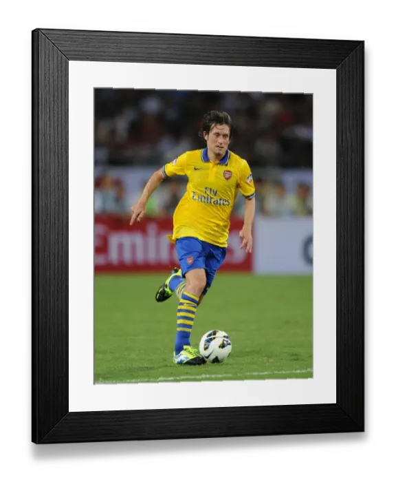 Framed Print : Tomas Rosicky in Action for Arsenal against Vietnam (2013-14) Framed Print : Tomas Rosicky in Action for Arsenal against Vietnam (2013-14)
