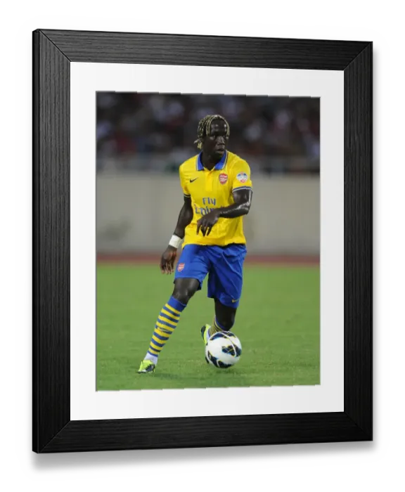 Framed Print : Bacary Sagna: In Action for Arsenal Against Vietnam (2013) Framed Print : Bacary Sagna: In Action for Arsenal Against Vietnam (2013)