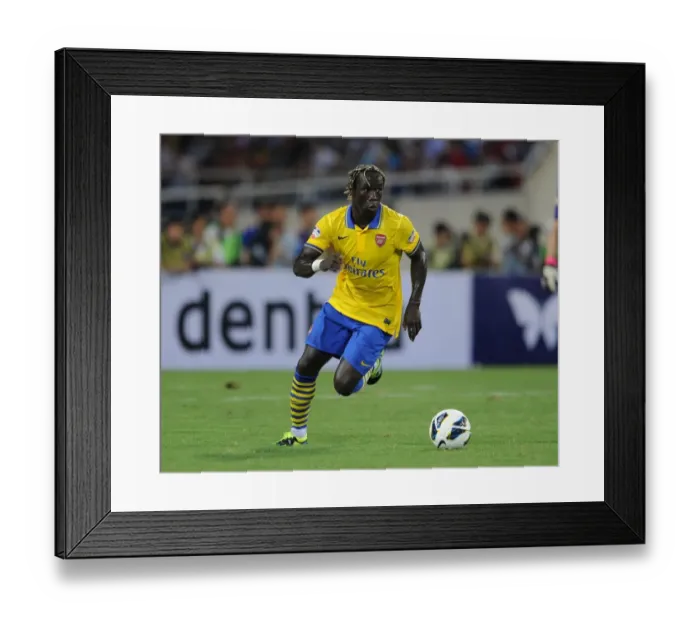 Framed Print : Bacary Sagna in Action: Arsenal vs Vietnam (2013) Framed Print : Bacary Sagna in Action: Arsenal vs Vietnam (2013)