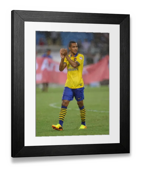 Framed Print : Theo Walcott Applauds Arsenal Fans in Vietnam after 2013 Friendly Match