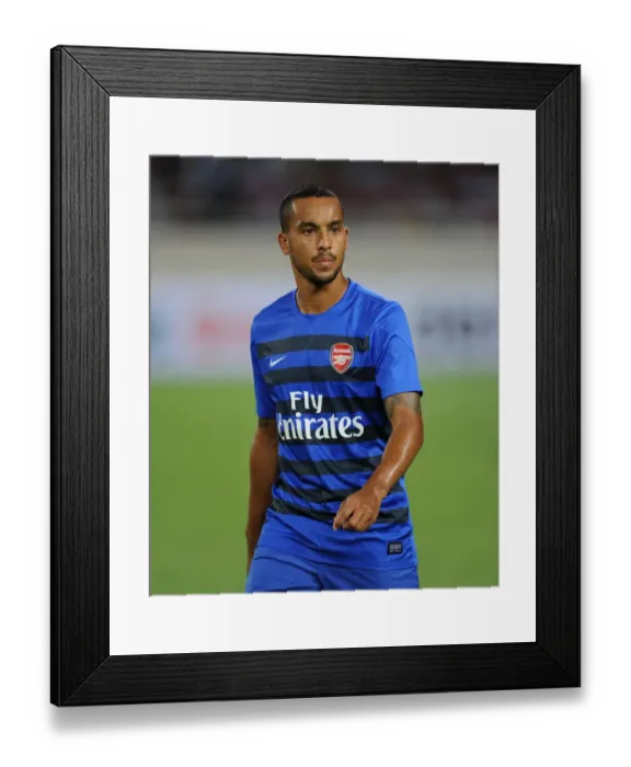 Framed Print : Arsenal FC Training in Vietnam: Theo Walcott Prepares for Vietnam Friendly Match (2013-14)