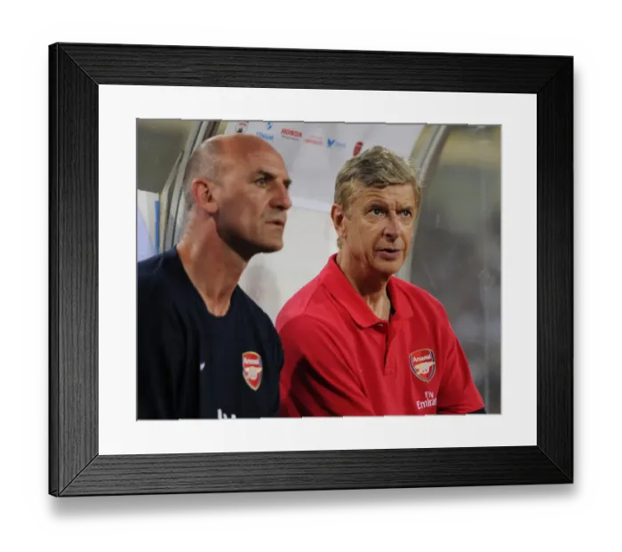 Framed Print : Arsene Wenger and Steve Bould: Preparing for Arsenal's Vietnam Friendly (2013)